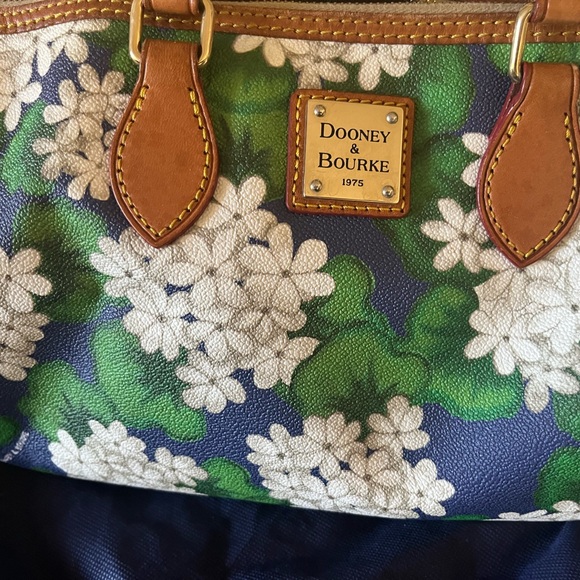 Dooney & Bourke Handbags - Dooney & Bouke coated Cotton floral printed Satchel in pre-owned condition.